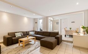 Spacious Apartment In City Center With Private Patio